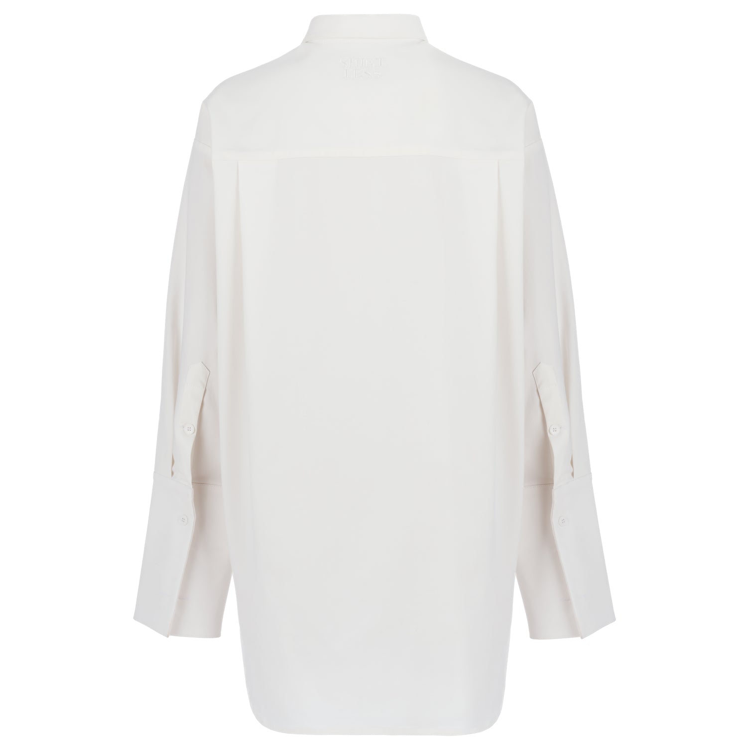 Back view of a white oversized shirt on a white background, emphasizing the elongated back and pleats for a flattering silhouette.